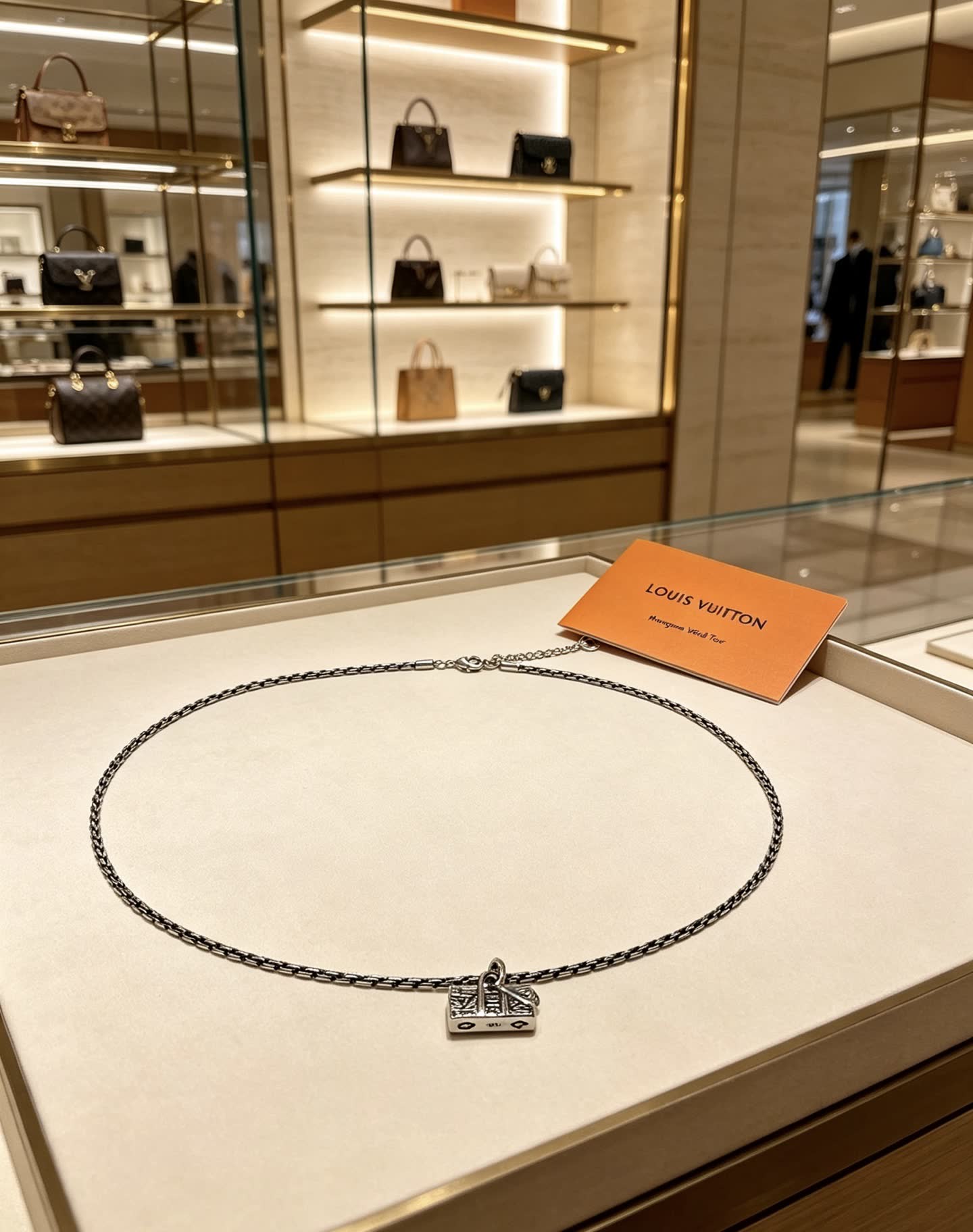 Louis Vuitton Silver Chain Necklace with Lock Charm